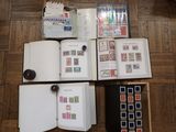 many different types of stamps on the pages of a book