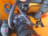 a person that is holding a camera and taking a picture