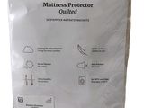the mattress protector is in the packaging on the white background