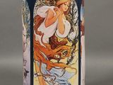 an image of a vase with a painting of a woman on it