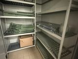 a room with a lot of shelves and shelves filled with food