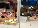 a pile of stuff on the floor next to a door