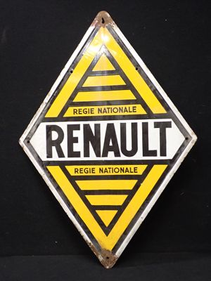 panneau jaune et noir portant l'inscription « Renault » sur fond noir