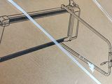 a drawing of a saw on a piece of cardboard