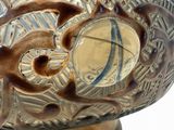 a close up of a glass bowl with a design on it