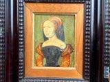 painting of a woman in a black dress in a wooden frame