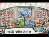 the box contains a collection of pokemon cards and other collectibles