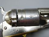 a close up of a gun that is on a table