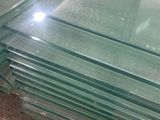 several pieces of clear glass stacked on top of each other