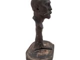 an image of a statue of a man with a tie on it