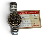 a watch that is sitting on top of a card