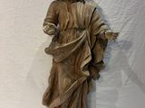 a statue of a woman holding a baby in her arms