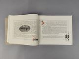 an open book with a picture of a man and a woman on it