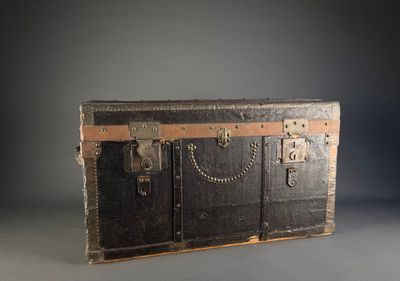 an old trunk that is sitting on a table
