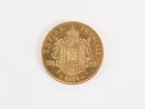 an image of a gold coin on a white surface