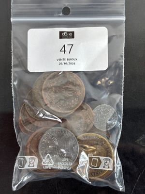 a bag of coins sitting on top of a table