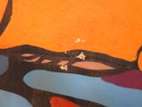 a painting on the wall of a bathroom with a toilet in it