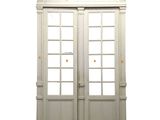an image of a pair of double doors on a white wall