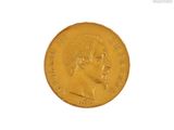 l'image d'une pièce d'or sur laquelle figure le portrait d'un homme