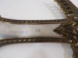 a pair of scissors sitting on top of a table