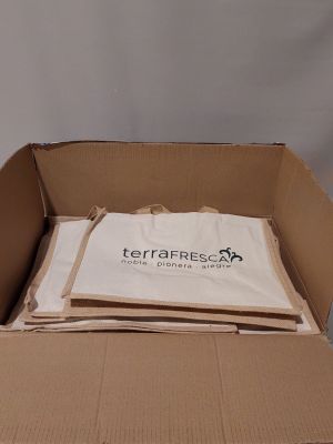 a cardboard box that has a lot of bags in it