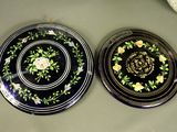 two plates that are sitting on a table