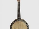 un gros plan d'un banjo sur fond blanc