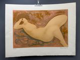 un tableau représentant une femme nue allongée sur le sol
