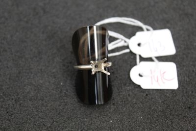 a ring with a star on it sitting on a table