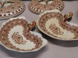 many plates that are sitting on a table