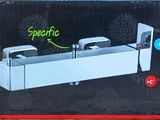 une boîte sur laquelle figure l'image d'un robinet de salle de bains