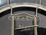 a close up of a metal object with a sign on it