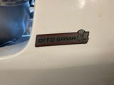 a close up of a motorcycle with a sticker on it