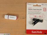 three different types of flash drives sitting on a table
