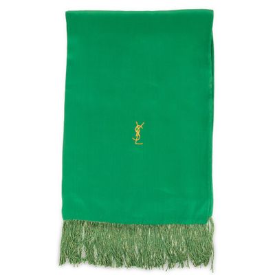 a green scarf with a gold deer on it