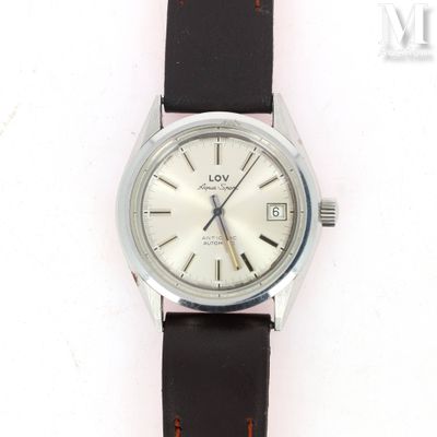 a watch that is sitting on a white surface