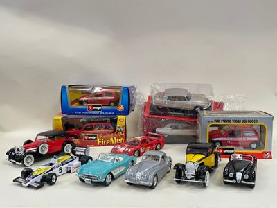 a lot of toy cars that are sitting on a table