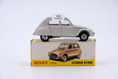a toy car that is sitting on top of a box