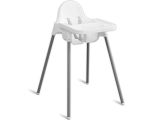 the high chair is white and has metal legs