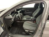 the interior of a car with the door open showing the driver ' s seat