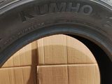 a close up of a tire with a box of boxes in the background