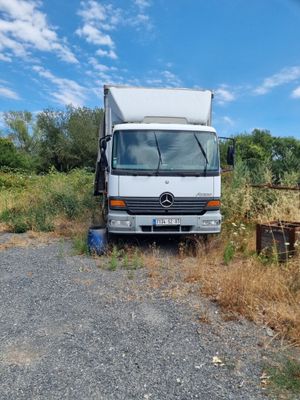 a truck that is parked on the side of the road