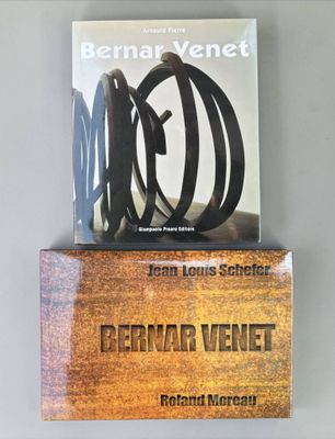 a book on top of a wooden box with a book on it
