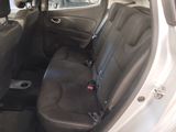 the back seats of a car are black and grey in color