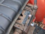 a small engine sitting on top of a lawn mower