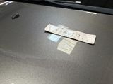 a sticker on the hood of a car