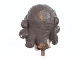 an image of a statue of an elephant on a stick