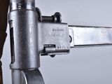 a close up of a chainsaw attached to the handle of a bag