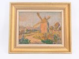 a picture of a painting of a windmill on the wall