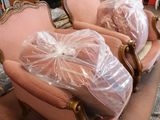 a lot of furniture that is wrapped up and ready to be shipped
